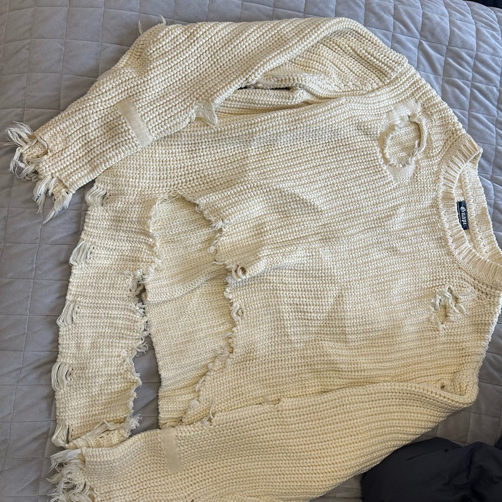 Guapi distressed sweater